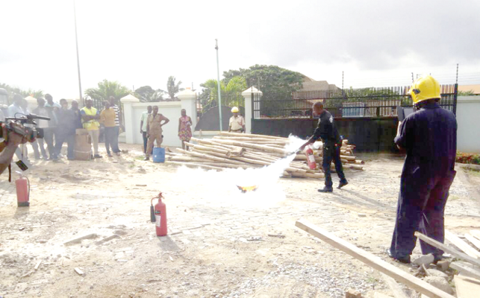• Some staff of Entrance Pharmaceuticals and Research Centre having a practical session  on fire-fighting with the LEKMA Fire Command 